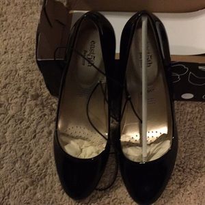 Black patent leather pumps
